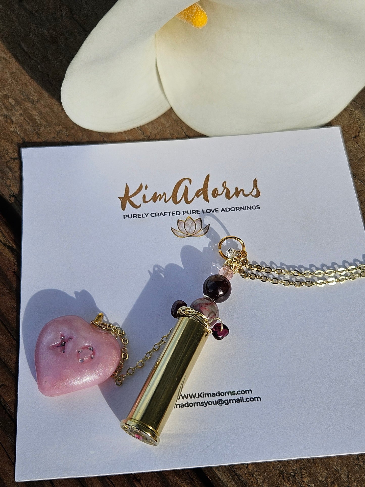 Pink heart loaded chamber pendant
