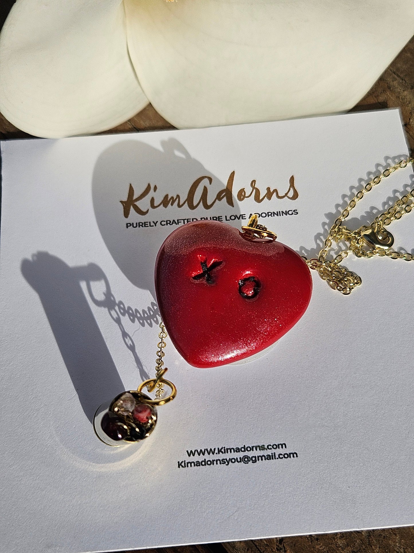 Red XO heart chamber pendant