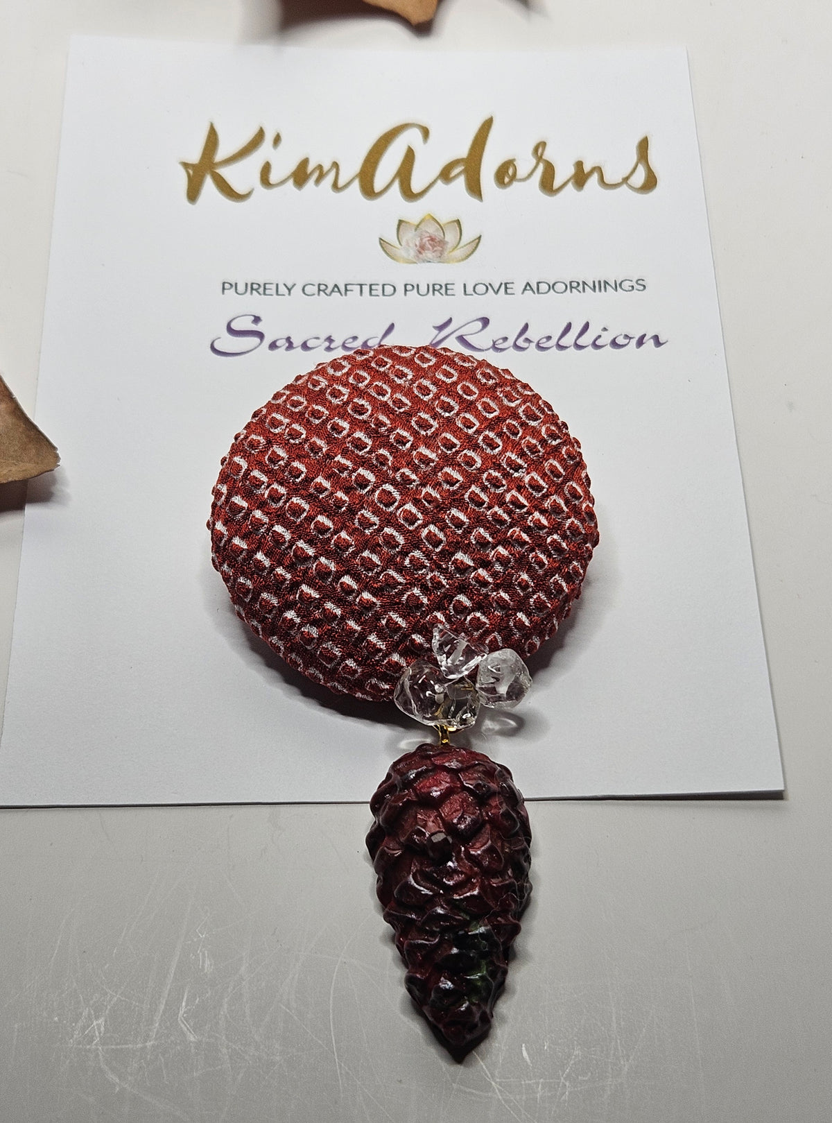 Brick red Shibori pinecone brooch